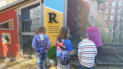 Checking out the chickens -- kids loved them!